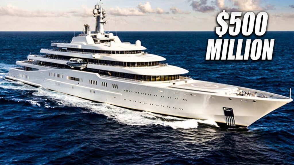 A $500 million luxury mega yacht cruising on the ocean, showcasing its grandeur and multiple decks 
The vessel's design philosophy centers on creating a residential community at sea, comb